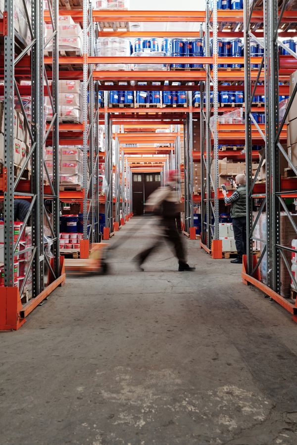 Warehouse aisle with stocked shelves